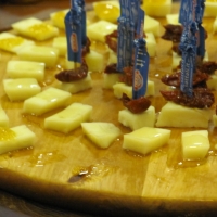 Tasting at the Central Market - pecorino with mustard jam, honey with truffle oil & sundried tomatoes