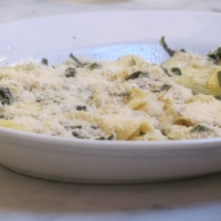 Ravioli with sage butter sauce & parmesan