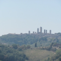 view of Tuscan countryside & San Gimignano in the distance