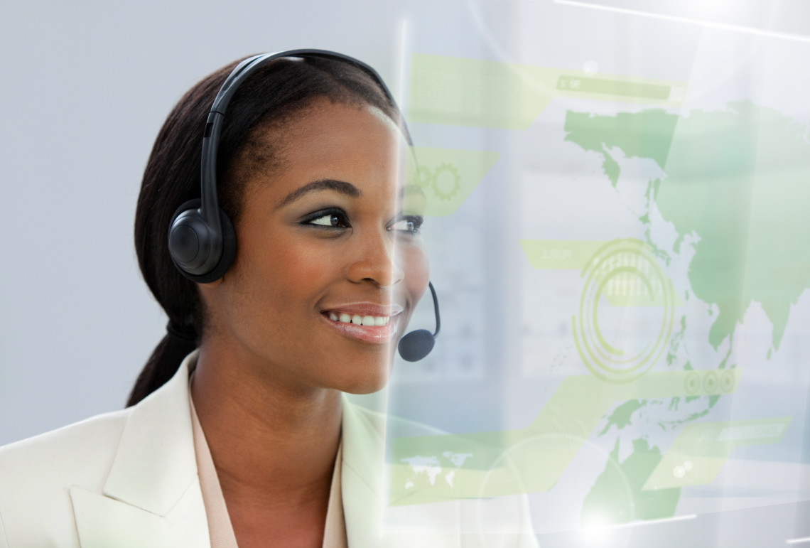 Content pretty businesswoman using futuristic interface hologram in bright office