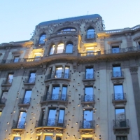 beautiful apartment/condo building lit up at night